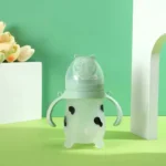 شیشه شیر سیلیکونی یوگی بی بی طرح گاو 180 میل - تصویر 5